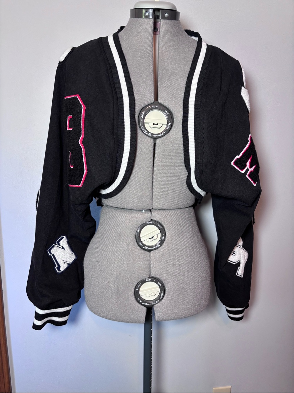 Akira Cropped Black Varsity Jacket with Patch Details. L/XL